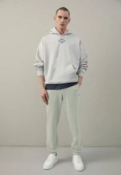 Holzweiler OSLO TROUSER - Tracksuit Bottoms - Teal