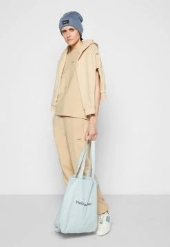 Holzweiler OSLO TROUSER - Tracksuit Bottoms - Beige -Holzweiler shop 529270beae8a40d89f9829f79d13baea