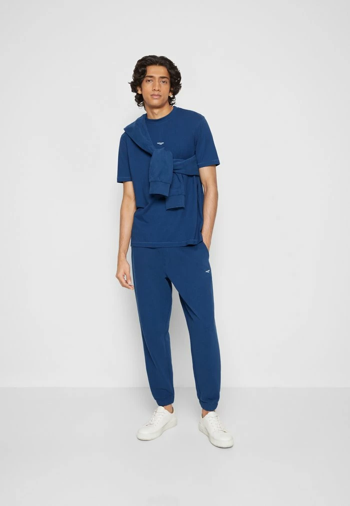 OSLO TROUSER - Tracksuit bottoms - navy Holzweiler OSLO TROUSER - Tracksuit Bottoms - Navy -Holzweiler shop 612d6a1f9aa948729e80df606dbd57bf
