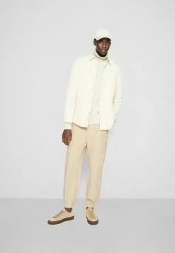 Holzweiler BANKS TROUSER - Trousers - Ecru -Holzweiler shop 6dc5f66b615d428db4dd17b4731ca516