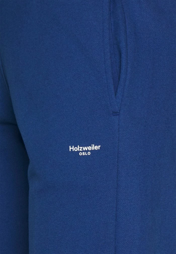 OSLO TROUSER - Tracksuit bottoms - navy Holzweiler OSLO TROUSER - Tracksuit Bottoms - Navy -Holzweiler shop 7416c12330d34ed0a236286492431403