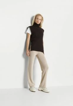 Holzweiler AURA - Leggings - Trousers - Sand -Holzweiler shop 9b26cb26d42e4f0e98dc107bfec3ed34