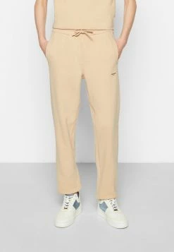 Holzweiler OSLO TROUSER - Tracksuit Bottoms - Beige -Holzweiler shop cdda4151b7c2420d9a4fc832555f35e3