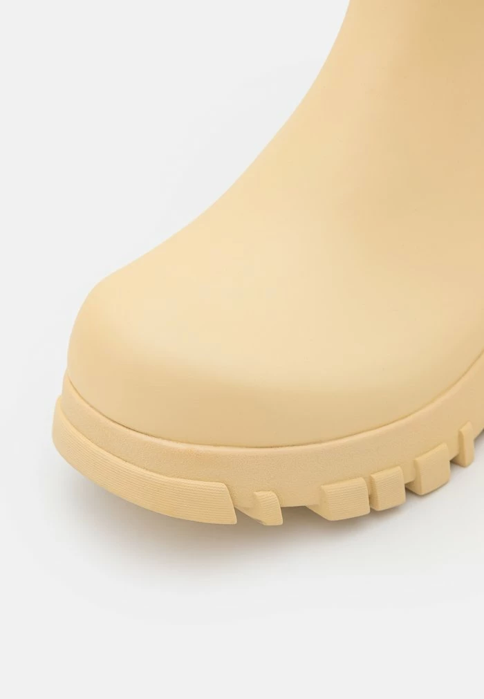 SOGNSVANN LOW BOOTS - Wellies - light yellow Holzweiler SOGNSVANN LOW BOOTS - Wellies - Light Yellow -Holzweiler shop e8b1a303ec0648c29a8d9f602250be39
