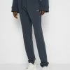 Holzweiler GABBY TROUSER - Tracksuit Bottoms - Navy -Holzweiler shop f823989851ab42aab868a5a1449ef743