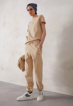 Holzweiler OSLO TROUSER - Tracksuit Bottoms - Beige